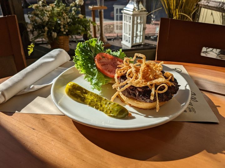 Brewer’s Alley signature dishes Alley BurgerSteak FritesBBQ Pulled Pork Nachos